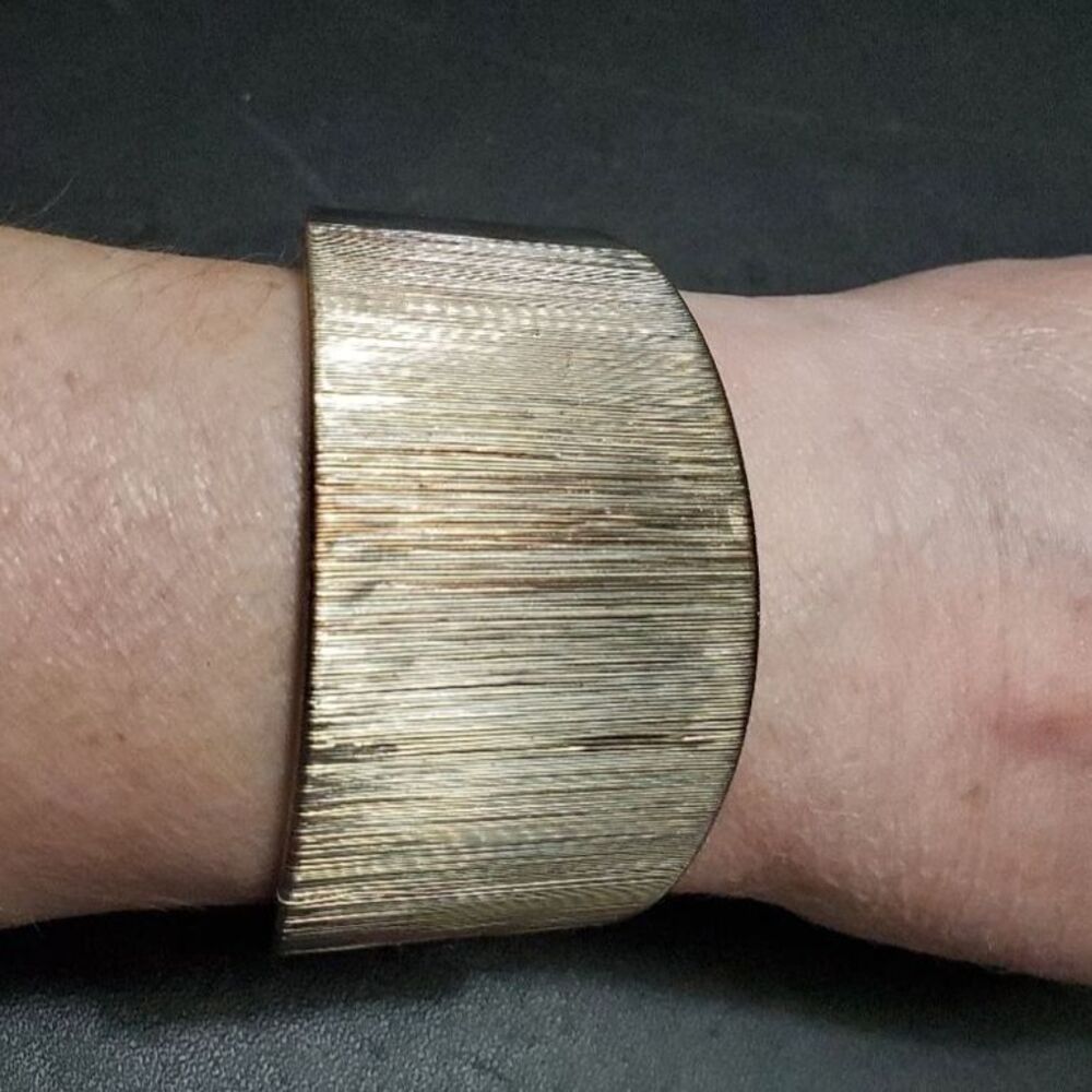 **Sale** Silver and copper colored cuff bracelet 7.5"